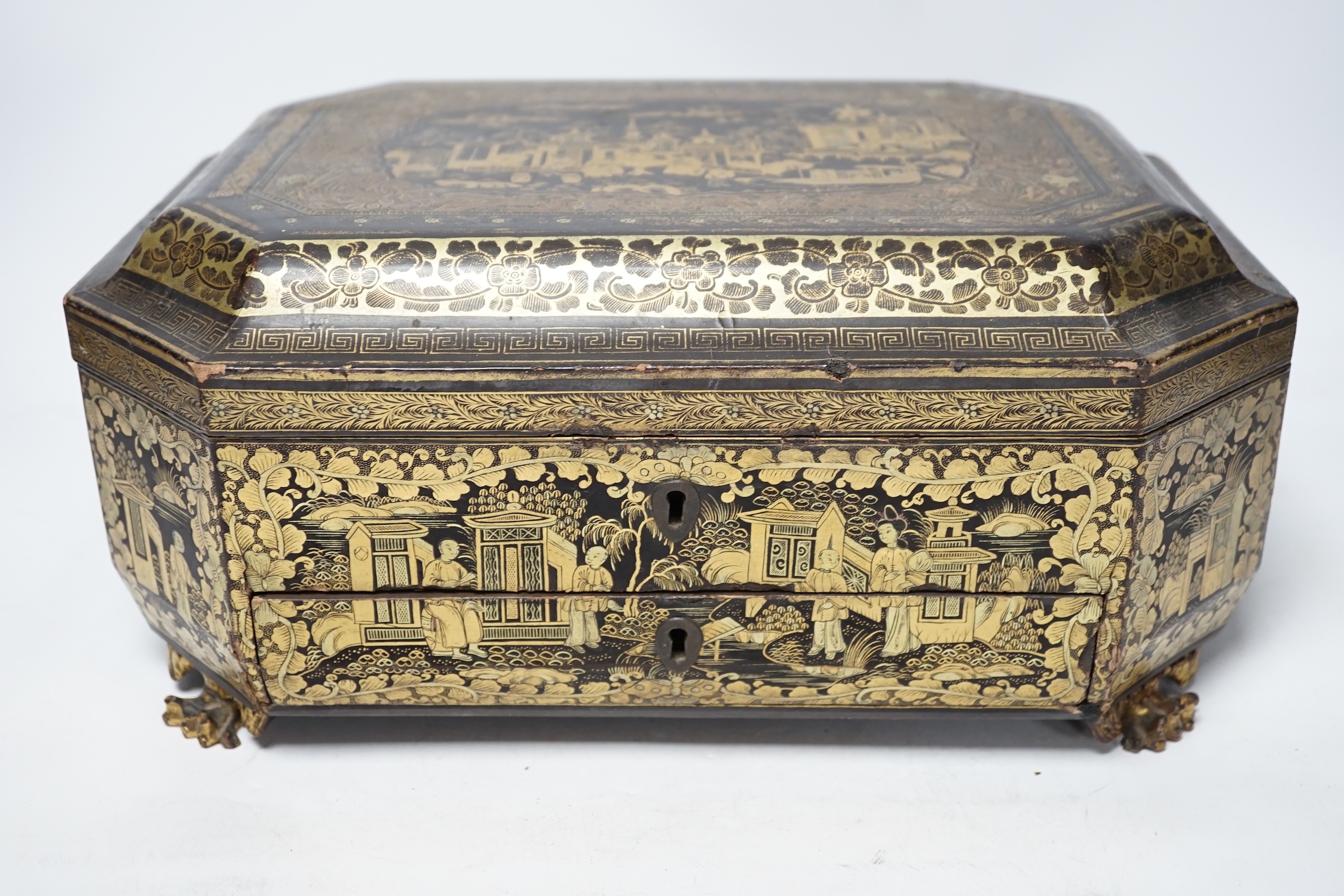 A mid 19th century Chinese export gilt decorated black lacquer work box and a George III mahogany tea caddy